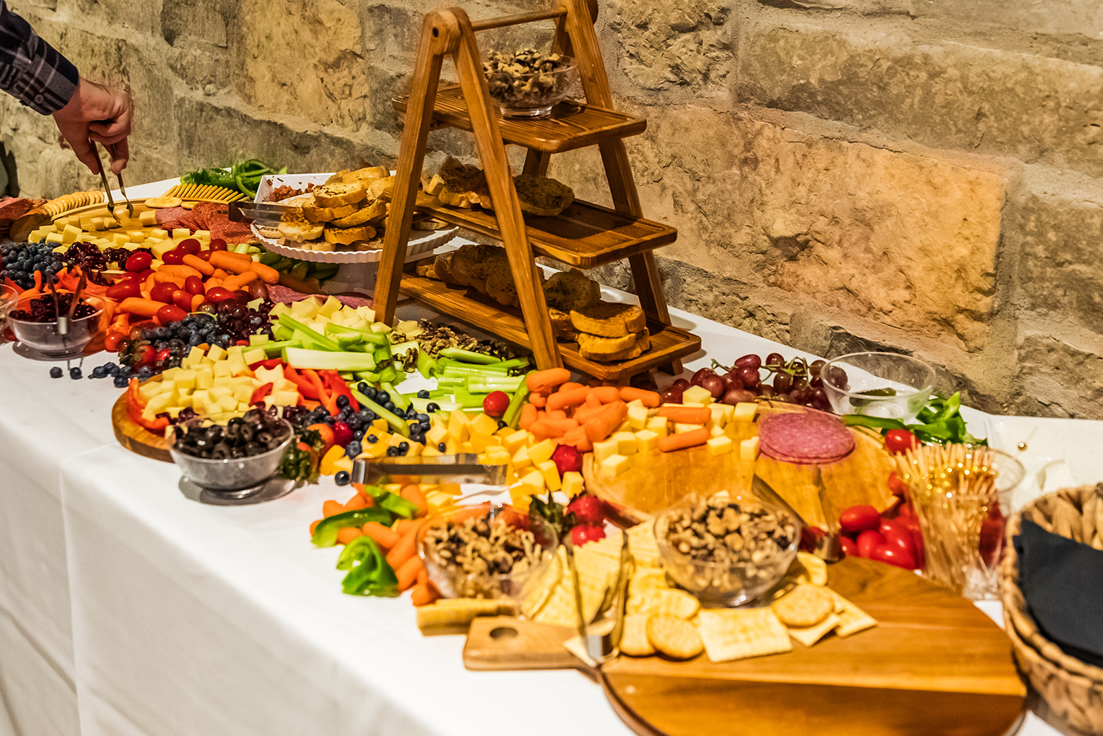 Mary's Market grazing spread with cheeses, cured meats, fresh vegetables, fruit, bread, and crackers